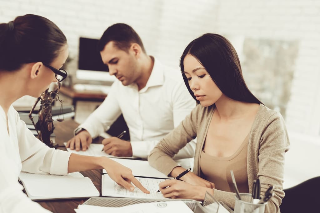 Lawyer Discussing With Her Client